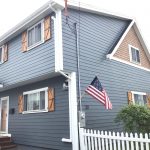 New Siding Side View with Portico